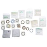 Rolex - assortment of date wheels in packets, with two Rolex vintage aluminium parts tin (14) (