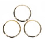 Rolex - three 18ct lady's fluted bezels, 25mm (3)