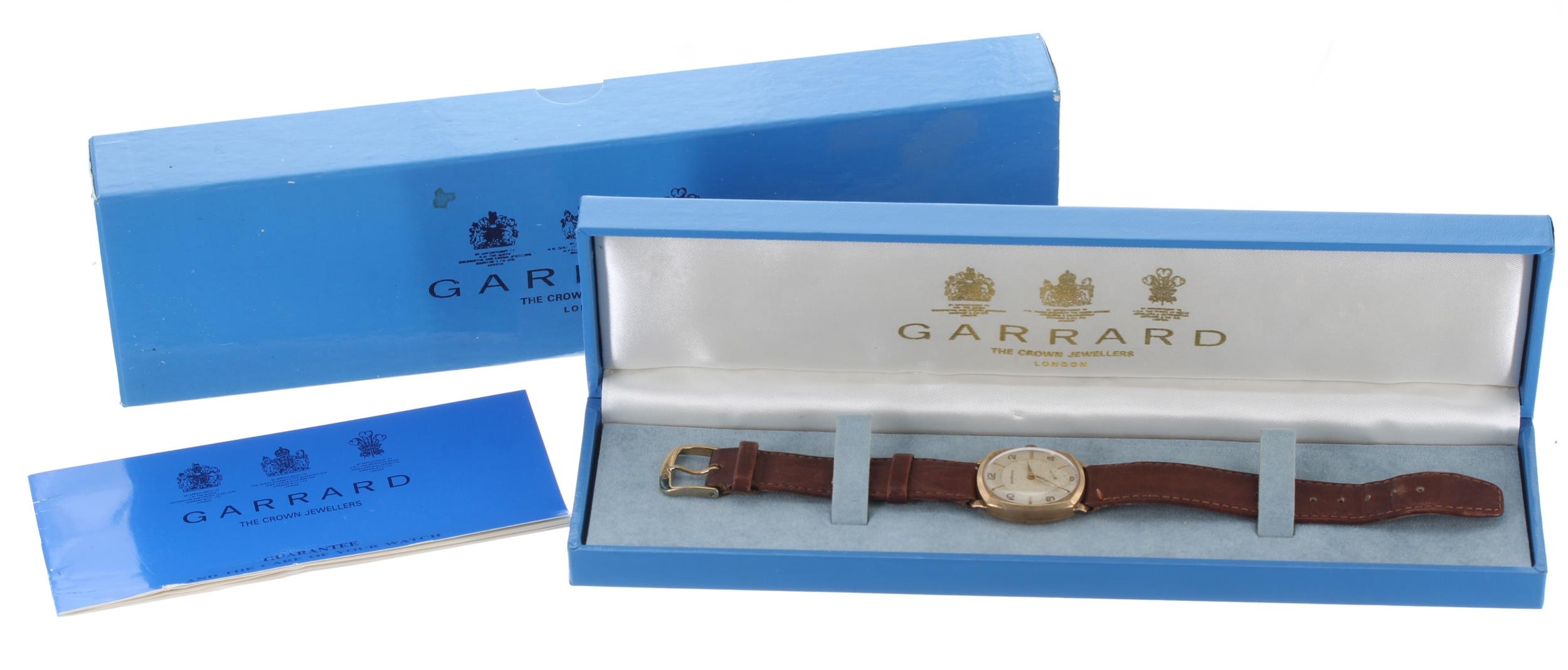 Garrard 9ct cushion case gentleman's wristwatch, Birmingham 1957, the signed circular silvered