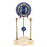 Junghans small globe mantel clock timepiece, the cobalt blue movement casing with applied Arabic
