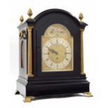 Good English triple fusee ebonised and ormolu mounted boardroom clock, the 7.5" brass arched dial