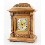 Light oak cased three train mantel clock, the Kienzle movement no. 37131 striking on five rods,