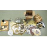 Small quantity of various clock fittings including winding keys, pendulums, dial glasses and bezels,