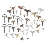 Thirty various steel and brass butterfly clock winding keys (30)