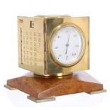 Good multi-functional brass desk piece, the cubed case fitted with a clock timepiece, barometer