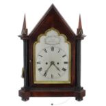 Good English rosewood gothic double fusee bracket clock, the 7" silvered wavy arched dial signed
