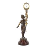 Junghans mystery clock, modelled as a bronzed lady holding the movement aloft and supported upon a