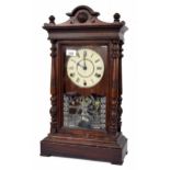 Seth Thomas mahogany three train shelf clock, the 5.75" cream dial bearing the maker's logo, the