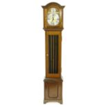Contemporary mahogany three train grandmother clock, the 8" brass arched dial with silvered