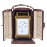 Good miniature striking carriage clock with alarm, the movement back plate stamped Swiss Made no.