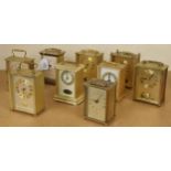 Nine various contemporary carriage type clocks all within brushed brass cases, tallest 7.25"high (9)