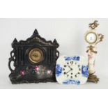 French painted white pottery pillar clock timepiece, 18.25" high (key); also a black pottery painted