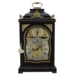 Good English ebonised double fusee verge bracket clock, the 7" brass arched dial signed Thos Hunter,