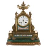 French ormolu and porcelain mounted two train mantel clock, the 3.5" white enamel dial signed Howell