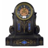 Good French black and lapis blue marble two train mantel clock striking on a bell, the 5.75"