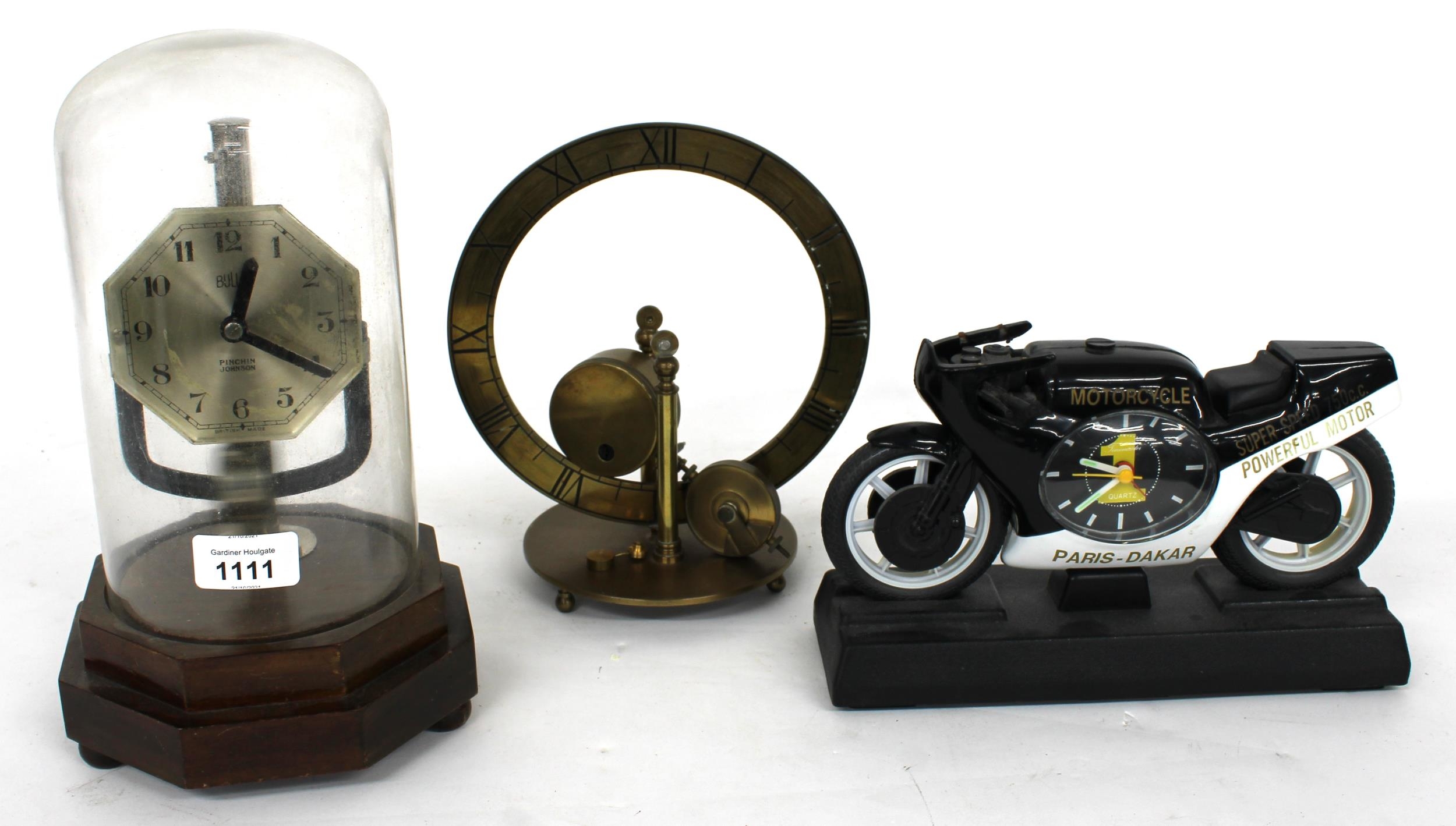 Bulle Pinchin Johnson electric mantel clock, under a glass dome and upon an octagonal stepped