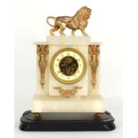 French alabaster and gilt metal mounted two train clock timepiece, the 3.75" cream chapter ring