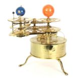 Contemporary brass electric orrery, raised upon a tripod base, 15" high