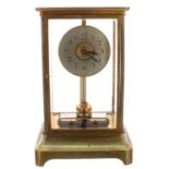 Good Regina (Holden) four glass brass electric mantel clock, the 3.5" silvered dial within a bevel