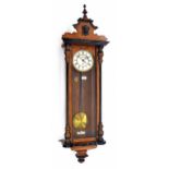 Walnut and ebonised single weight Vienna regulator wall clock, the 6.25" white dial with