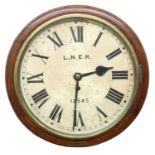 London North Eastern Railway (L.N.E.R) oak single fusee 12" wall dial clock within a turned