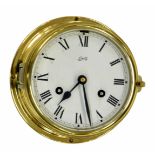 Schatz two train wall clock, the 5.5" white dial within a brass case