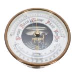 Brass drumhead aneroid barometer, 4.75" chapter ring fitted with a thermometer and enclosing an open