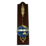Devon clock globe timepiece, the movement contained within a blue metal globe with raised gilt