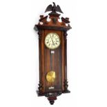 Walnut Vienna regulator wall clock, the 7" cream dial with subsidiary seconds dial, within a