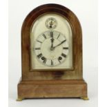 Unusual mahogany two train ting-tang mantel clock, the 5.5" silvered arched dial with silvered