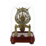 Small English brass single fusee skeleton clock, the 4" silvered chapter ring signed Thompson,