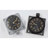 Leonidas car clock, the 2" black dial with subsidiary seconds dial and within a square chrome