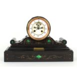 Small French black slate drumhead two train mantel clock striking on a bell, the 3.75" white chapter