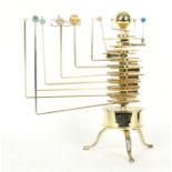 Contemporary brass electric orrery, raised upon a tripod base, 13.5" high