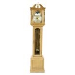 Contemporary light oak three train grandmother clock, the 9" brass arched dial signed Emperor