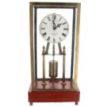Colin Walton design electric mantel clock, the 4.75" white dial with subsidiary seconds dial, upon