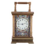 French carriage clock striking on a gong, the 2" cream dial within a champleve foliate enamelled