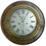 Brass bulkhead two train wall clock, the 8" silvered dial with subsidiary seconds dial and slow/fast