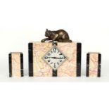 Art Deco coloured marble mantel clock garniture, the diamond silvered dial inset into a