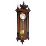 Walnut, oak and ebonised Vienna double weight regulator wall clock, the 6.25" white dial with