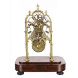 Brass single fusee skeleton clock, the 4.25" silvered pierced chapter ring and movement upon four