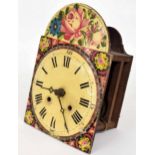 Black Forest two train wooden movement shield wall clock striking on a bell behind the dial arch,
