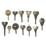 Twelve various large English brass dial clock keys (12)