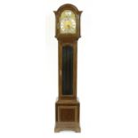 Oak three train grandmother clock, the 9.25" brass arched dial with silent strike and chime/silent