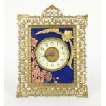 Unusual brass and blue enamel cased easel clock timepiece, the movement with platform escapement,