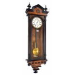 Walnut and ebonised single weight Vienna regulator wall clock, the 6.75" white dial with