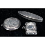 Edward VII small silver vesta case, with foliate engraved decoration around a monogrammed cartouche,