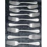 Nine James Deakin & Son silver forks, monogrammed to the handles, Sheffield, six marked 1922,