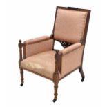 Early 20th century mahogany framed library armchair, the square upholstered back over pierced scroll