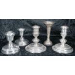 Two pairs of squat silver candlesticks, the first by William Comyns & Sons Ltd, London 1974, 4"